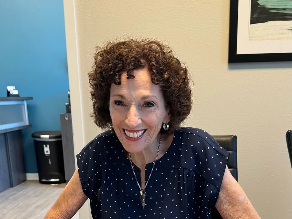Client at the signing table after closing