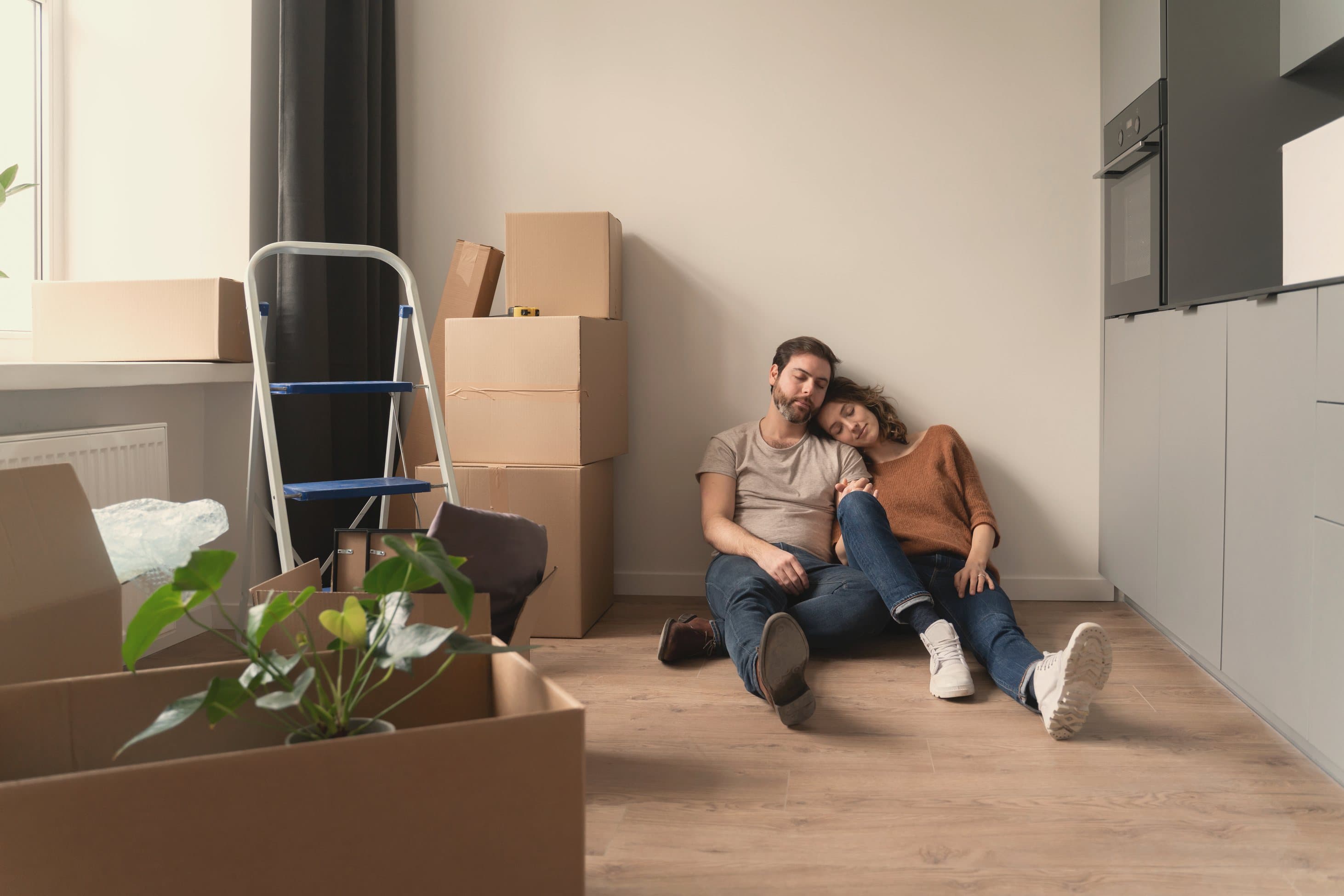 A first-time Florida homebuyer reviewing FHA loan numbers at home in warm natural light